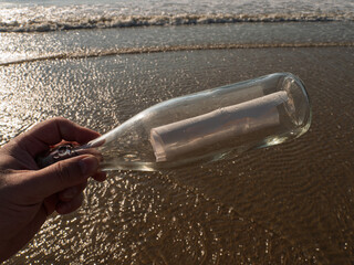 Message in a Bottle Found on Sandy Beach