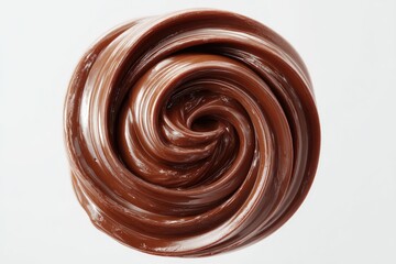 Swirled, rich brown chocolate topping, viscous and glossy, creates a mesmerizing spiral pattern against a stark white backdrop