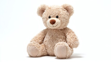 Obraz premium A cuddly plush teddy bear sits cheerfully on a pristine white background, emanating warmth and comfort with its soft fur and gentle smile.