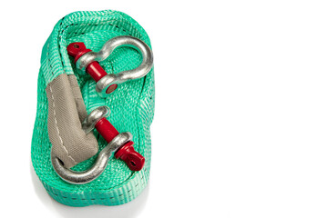 A set for moving a broken-down car, including a curved holder and a towing rope. Close-up photo, white background. Space for text.