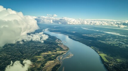 An aerial perspective of a large river cutting through land