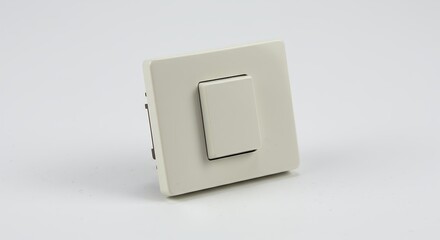 Beige light switch isolated on white background
