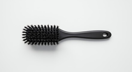 Black cleaning brush on white background