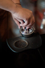 Close up of barista prepare to make coffee