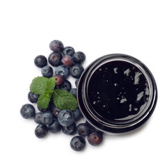 Sweet jam in jar, blueberries and mint isolated on white, top view