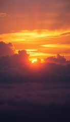 Obraz premium Golden sunrise paints clouds vibrant hues, soft light illuminates tranquil landscape, serene, golden hour