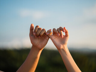 Heartwarming Pinky Promise Moment at Sunset