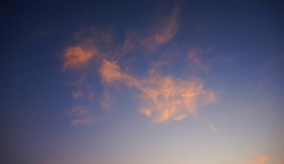 yellow clouds in the blue sky, the afternoon sky with yellow clouds hit by the sunlight