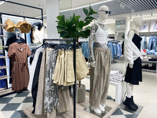  Contemporary retail store interior displaying casual women's summer wear