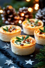 Festive mini quiches adorned with silver stars and frosted pinecones elevate holiday gatherings with elegance and charm