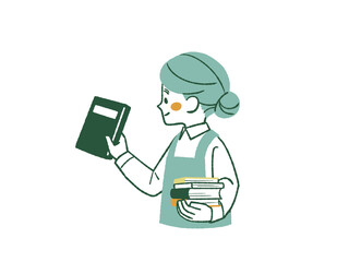 笑顔で本を持っているエプロンを着用した女性