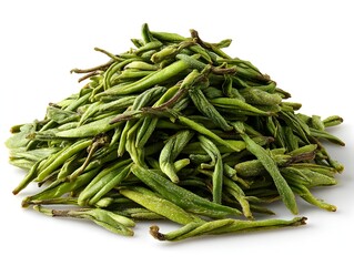Fototapeta premium A pile of dried green tea leaves is displayed against a solid white background in a studio environment.