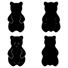 Four gummy bears in black silhouette arranged in a square formation on a white background pattern view