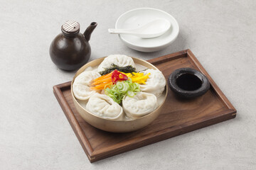  Dumplings are food made by kneading flour or other dough and filling it with vegetables, meat, and...