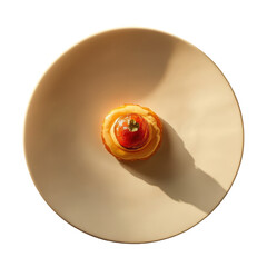 Single round tartlet with tomato topping on plate