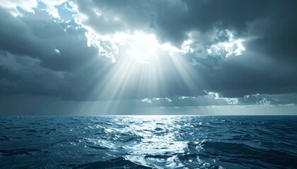 A serene view of the ocean under dramatic clouds, illuminated by beams of sunlight breaking through. Peaceful and breathtaking.