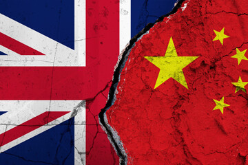 United Kingdom and China Split on Textured Surface Symbolizing Collaboration. Torn Flags Between...
