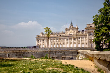 Obraz premium Madrid, Spain - May 30, 2025: Exterior of the Royal Palace of Madrid in the Centro district of Madrid in Spain 