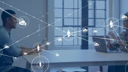 Colleagues swiping tablet and typing laptop, building tech network linking cloud and people icons