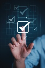 A hand interacting with a digital check mark interface.