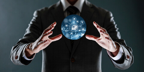 businessman holding a sphere with a globe in his hands.