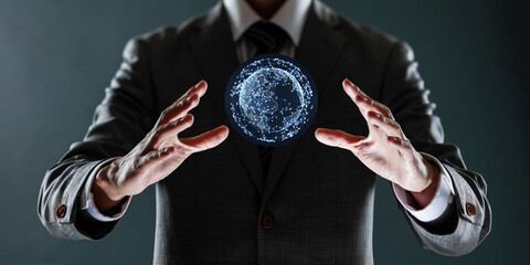 businessman holding a sphere with a globe in his hands.