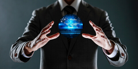 businessman holding a sphere with a globe in his hands.