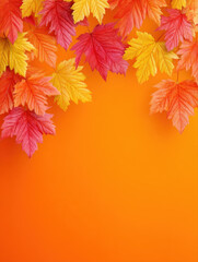 Autumn leaves in red, yellow, and orange colors hang over bright orange background, creating warm seasonal fall design