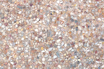 Colorful multicolored gravel on wall background