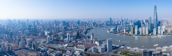 Fototapeta premium Aerial view of Shanghai modern buildings and traditional residential buildings on sunny day.