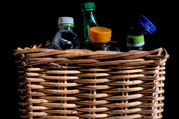 Used plastic bottles in the basket