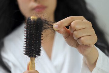 Women with hair loss dryness and frizziness