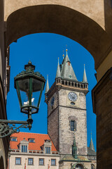 Medieval tower of the city hall in the historical center of the capital of the Czech Republic -...