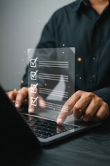 Person working on a laptop with a checklist overlay.
