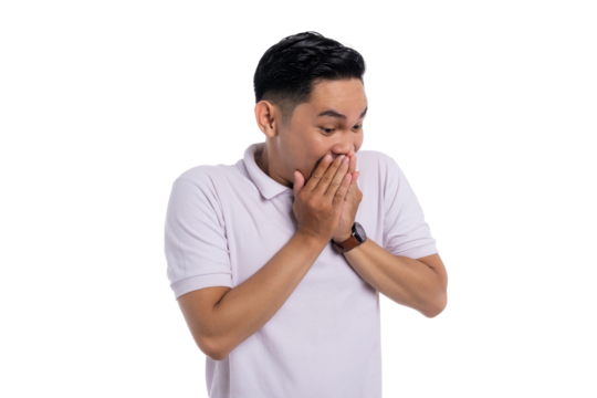 Surprised young man covering mouth with both hands wearing casual polo shirt isolated on transparent background