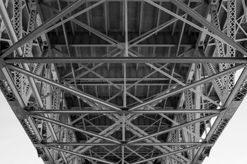 Black and White View of Steel Bridge's Geometric Underside