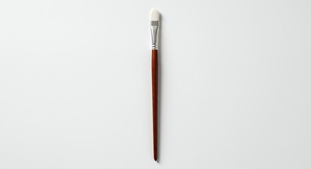 Fototapeta premium Single paintbrush isolated on white background