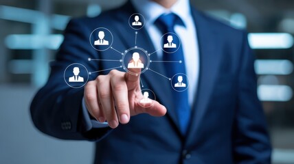 Businessman interacting with a network of user icons.