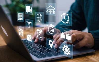 Person using laptop with digital logistics icons overlaid.