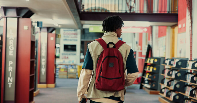 Walking, university and back with student in library for learning, research project or study resource. College thesis, scholarship opportunity and backpack with person on campus for school course