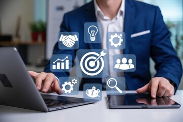 Businessperson using a laptop and tablet with business strategy icons overlaid.