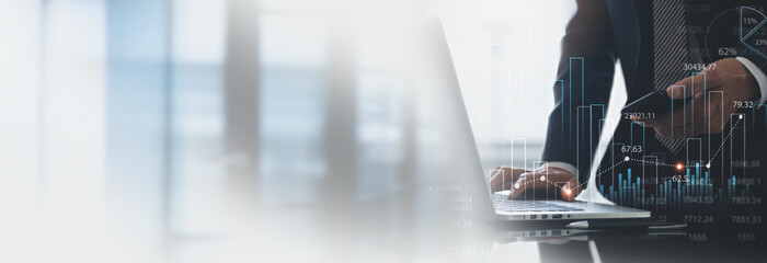 Finance analyst working on business analytics and data management system to make financial report...
