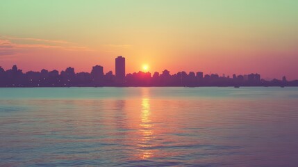 Obraz premium Tranquil cityscape at sunset, a captivating panorama of urban serenity and light