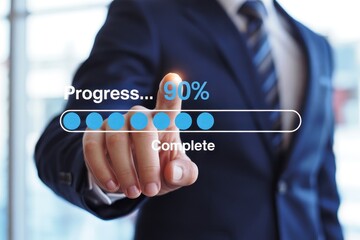 Hand pointing at a progress bar showing 90% complete.