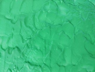 Close up of green cream detergent texture background	