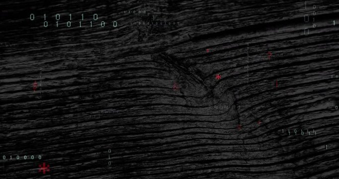 Small red symbols emerging triggers swirling code transforming to show code flow on wood texture