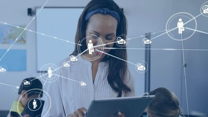 Teacher tapping tablet and building network linking user and cloud icons for digital collaboration - Powered by Adobe