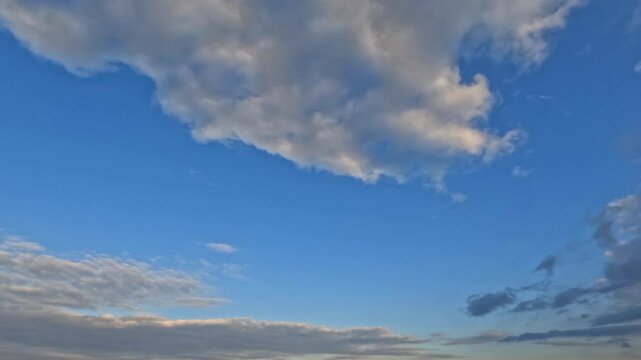 pretty timelapse clip of fluffy clouds - natural background