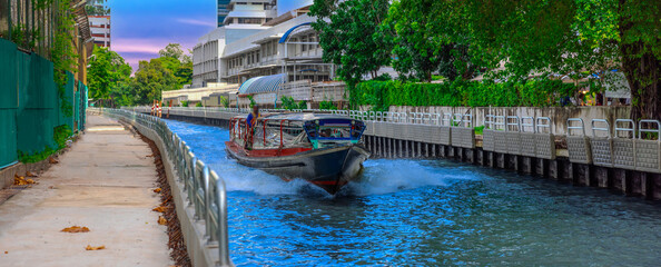 Ferry boat going through a Canal Khlong in Thai running from Soi 15 Sukhumvit Rd NANA to Soi 21...
