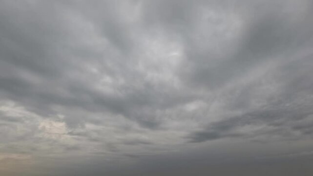 timelapse clip of massive grey snow or rain clouds